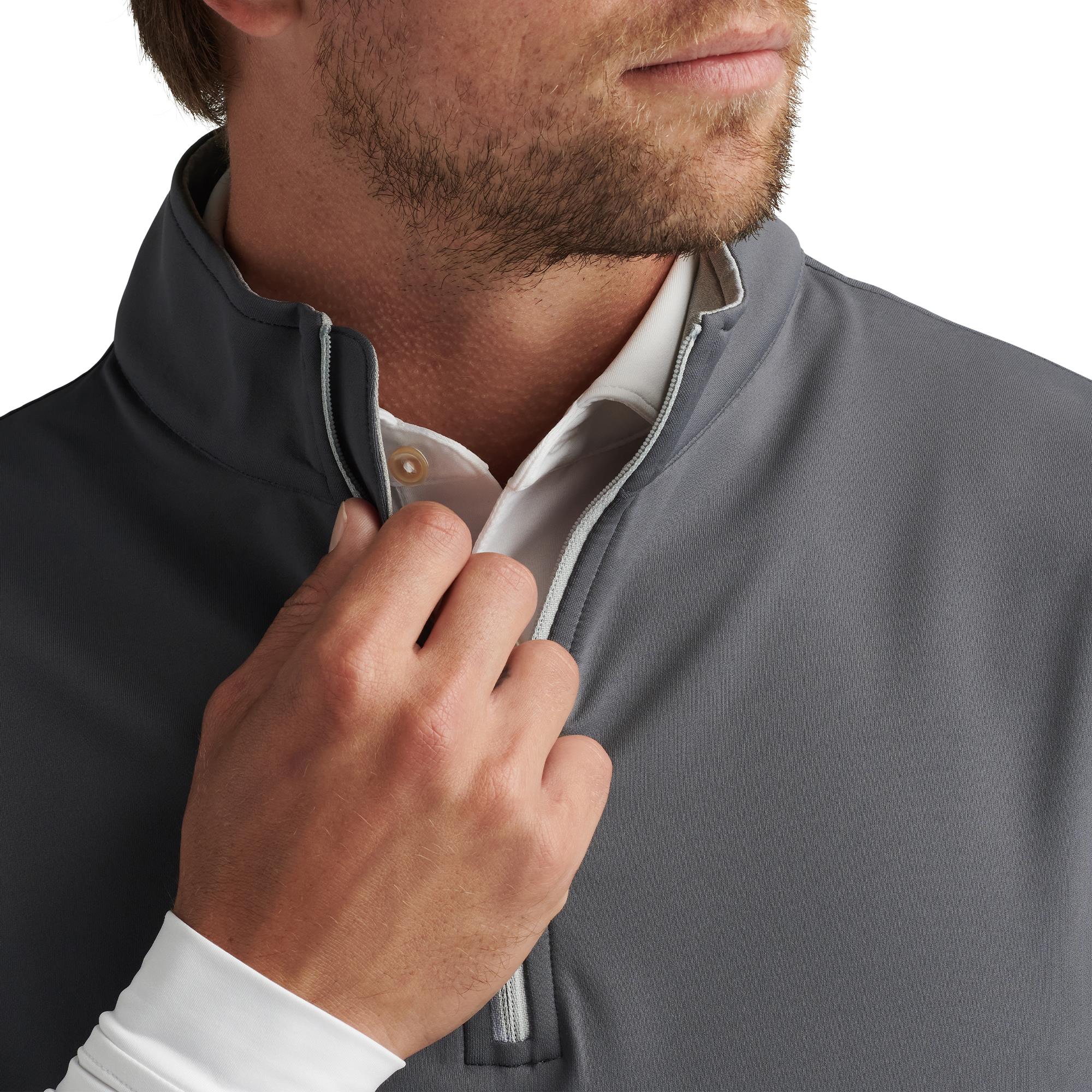 Close-up of collar and zip on Peter Millar Galway Stretch Loop 1/4 Zip Vest – luxury mens golf clothing